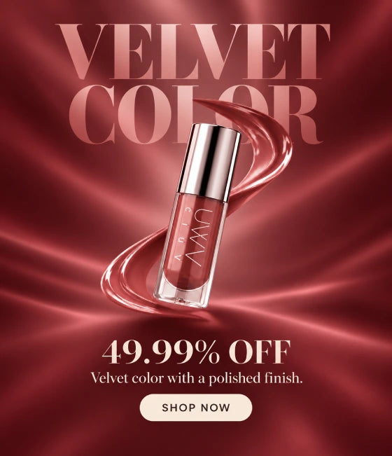 A cosmetic liquid lip product shown on a rich burgundy satin-like background with large text reading 'VELVET COLOR' and additional sale text '49.99% OFF' plus a 'SHOP NOW' button.